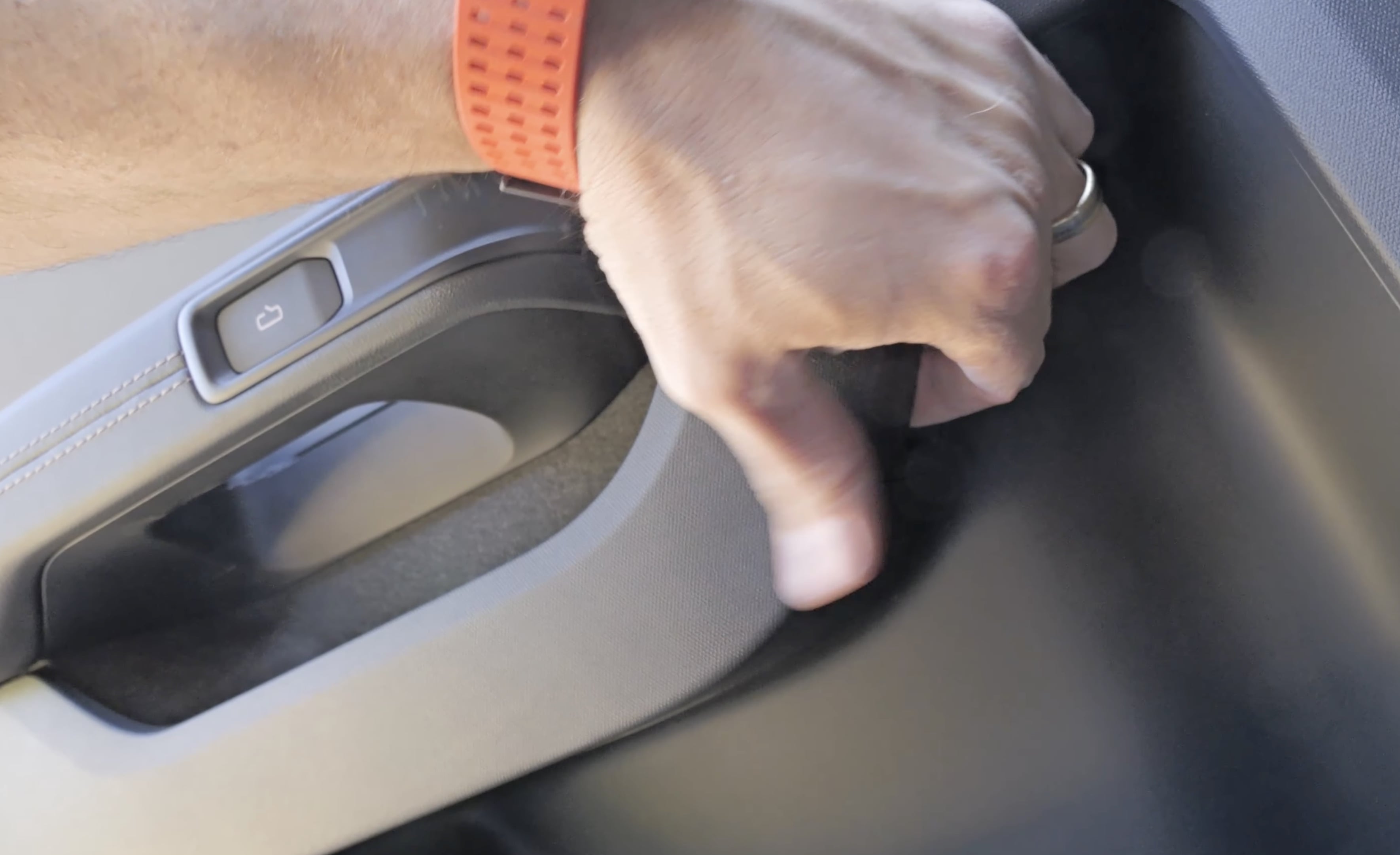 Zack from Jerry Rig Everything's hand the rear hatch release thing for the manual door release cable